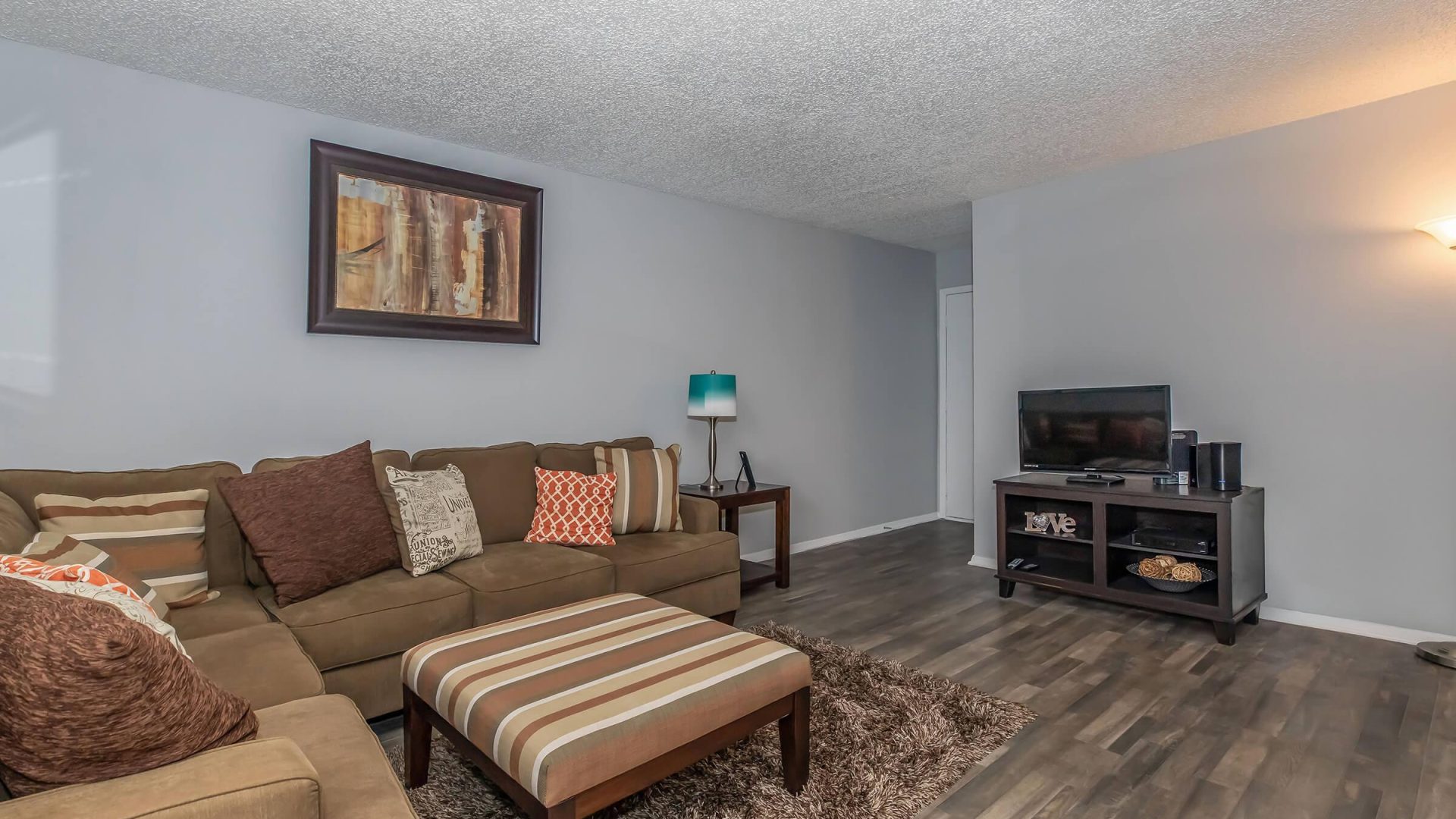 a living room filled with furniture and a fire place